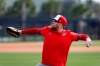 Washington Nationals pitcher Sean Doolittle throws during spring training baseball practice Friday, Feb. 14, 2020, in Jupiter, Fla. (AP Photo/Jeff Roberson)