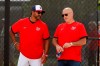 Washington Nationals manager Dave Martinez, left, talks with general manager Mike Rizzo during spring training baseball practice Monday, Feb. 17, 2020, in West Palm Beach, Fla. (AP Photo/Jeff Roberson)
