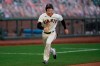 San Francisco Giants' Mike Yastrzemski runs toward home to score against the San Diego Padres during the first inning of a baseball game in San Francisco, Tuesday, July 28, 2020. (AP Photo/Jeff Chiu)