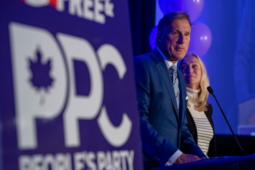 The Canadian Press
People's Party of Canada Leader Maxime Bernier and wife Catherine Letarte speaks from a podium to supporters during the PPC headquarters election night event in Saskatoon, Sask., Monday, Sept. 20, 2021. THE CANADIAN PRESS/Liam Richards