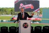 Baseball Commissioner Rob Manfred takes questions about the Houston Astros during a news conference at the Atlanta Braves' spring training facility Sunday, Feb. 16, 2020, in North Port, Fla. (Curtis Compton/Atlanta Journal-Constitution via AP)