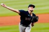 Boston Red Sox starting pitcher Tanner Houck (89) delivers a pitch in the first inning of a baseball game against the Atlanta Braves on Saturday, Sept. 26, 2020, in Atlanta. (AP Photo/John Bazemore)