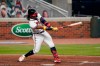 Atlanta Braves' Ronald Acuna Jr., strikes out in the fourth inning of a baseball game against the Miami Marlins on Tuesday, Sept. 22, 2020, in Atlanta. (AP Photo/Brynn Anderson)