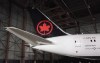 Air Canada is revamping its Aeroplan loyalty program in an effort to make it easier to use. The tail of the newly revealed Air Canada Boeing 787-8 Dreamliner aircraft is seen at a hangar at the Toronto Pearson International Airport in Mississauga, Ont., Thursday, Feb. 9, 2017. THE CANADIAN PRESS/Mark Blinch