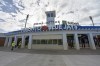 Several players and staff members on the Toronto Blue Jays have tested positive for COVID-19, a source has told The Canadian Press. Construction workers walk past the main entrance to the TD Ballpark, the Florida home of Toronto Blue Jays, as they get the stadium ready in Dunedin, Fla., Sunday, Feb. 16, 2020. THE CANADIAN PRESS/Steve Nesius