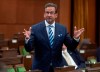 Bloc Quebecois Leader Yves-Francois Blanchet rises during a sitting of the Special Committee on the COVID-19 Pandemic in the House of Commons in Ottawa, Wednesday, Aug. 12, 2020. THE CANADIAN PRESS/Adrian Wyld