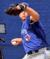 Toronto Blue Jays pitcher Nate Pearson throws in the bullpen during full squad workouts at the team's spring training complex in Dunedin, Fla., Tuesday, Feb. 18, 2020. The top Toronto Blue Jays prospect will make his major-league debut Wednesday night in Washington against the Nationals. THE CANADIAN PRESS/Steve Nesius