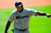 Miami Marlins' Jesus Aguilar comes off the field to congratulations at the end of the fourth inning of a baseball game against the Atlanta Braves, Monday, Sept. 7, 2020, in Atlanta. Aguilar hit a one-run line drive single to left field during the inning. (AP Photo/John Amis)
