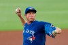 Toronto Blue Jays starting pitcher Nate Pearson (24) works in the first inning of a baseball game against the Atlanta Braves Thursday, Aug. 6, 2020, in Atlanta. (AP Photo/John Bazemore)