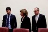 From left, Italy's Minister of Health Roberto Speranza, European Commissioner for Health Stella Kyriakides and World Health organization Director for Europe Hans Kluge arrive for a press conference at the end of their meeting in Rome, Wednesday, Feb. 26, 2020. (AP Photo/Gregorio Borgia)