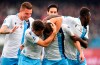 Lazio's Adam Marusic, second right, celebrates with teammates after scoring his side's opening goal during the Serie A soccer match between Genoa and Lazio, at the Luigi Ferrari stadium in Genoa, Italy, Sunday, Feb. 23, 2020. (Tano Pecoraro/Lapresse via AP)