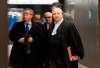 SNC-Lavalin lawyer Francois Fontaine, right, and company representatives leave the courthouse in Montreal, Wednesday, December 18, 2019, after the engineering giant pleaded guilty to a fraud charge in relation to business dealings in Libya. THE CANADIAN PRESS/Graham Hughes