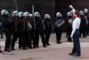 A protester confronts a line of police officers during a demonstration calling for justice in the death of George Floyd and victims of police brutality in Montreal, Sunday, May 31, 2020.THE CANADIAN PRESS/Graham Hughes