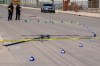 ALEX LUPUL / WINNIPEG FREE PRESS  
Police officers work at the scene of a motor vehicle collision involving a pedestrian near the corner of Logan Avenue and Tecumseh Street in Winnipeg on Tuesday.