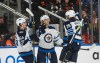 Mark Scheifele (from left), Kyle Connor and Blake Wheeler should all be heading back to Winnipeg sometime in the next few weeks. (Jason Franson / The Canadian Press files)