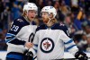 Patrik Laine and Kyle Connor missed this season's first training camp, but would be part of the next one. (Jeff Roberson / The Canadian Press files)