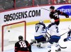 CP
Ottawa Senators left wing Brady Tkachuk (7) watches the puck go in the net of Winnipeg Jets goaltender Connor Hellebuyck (37) after a tip in, during third period NHL hockey action in Ottawa, Sunday, April 10, 2022. THE CANADIAN PRESS/Justin Tang