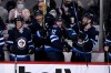 CP
Blake Wheeler (second from left) playing in his 1,000th NHL game on Sunday. (Fred Greenslade / The Canadian Press)