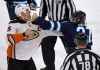 FRED GREENSLADE / THE CANADIAN PRESS
Winnipeg Jets' Nikolaj Ehlers (27) takes a swing at Anaheim Ducks' Ryan Getzlaf (15) as they fight during first period.
