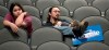 Jeff Lopez holds his son, Tristan, 4, as they and Jeff's wife, Jessika, sit in an area for Bernie Sanders supporters during the Woodbury County Third Precinct Democratic caucus, Monday, Feb. 3, 2020, at West High School in Sioux City, Iowa. Iowans across the state attended Democratic and Republican caucuses Monday. (Tim Hynds/Sioux City Journal via AP)