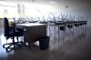 An empty teacher's desk is seen at the front of a empty classroom at McGee Secondary school in Vancouver on September 5, 2014. THE CANADIAN PRESS/Jonathan Hayward