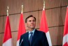 Minister of Finance Bill Morneau announces his resignation during a news conference on Parliament Hill in Ottawa, on Monday, Aug. 17, 2020. THE CANADIAN PRESS/Justin Tang