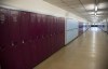 A empty hallway is pictured at Eric Hamber Secondary school in Vancouver, B.C. Monday, March 23, 2020. Alberta's education minister, in her first public comments since laying off more than 20,000 people in an email on the weekend, resisted Opposition calls Tuesday to reverse her decision. THE CANADIAN PRESS/Jonathan Hayward