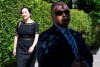 A security guard looks on as Meng Wanzhou, chief financial officer of Huawei, leaves her home to go to B.C. Supreme Court in Vancouver, Wednesday, May 27, 2020. The federal government is trying to block Huawei executive Meng Wanzhou's access to some documents in her extradition case, arguing in court documents that disclosing sensitive information would harm national security. THE CANADIAN PRESS/Jonathan Hayward