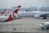 Air Canada planes sit on the tarmac at Pearson International Airport in Toronto on Wednesday, April 8, 2020. The union representing Air Canada flight attendants says the airline will now ask employees to work less, or not at all, as concerns over job security buffet the airline industry. THE CANADIAN PRESS/Nathan Denette