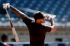 FILE - In this July 8, 2020, file photo, San Diego Padres third baseman Manny Machado bats during baseball training at Petco Park in San Diego. Machado has vowed to play better than he did during his first season after signing a $300 million, 10-year deal. (AP Photo/Gregory Bull,File)