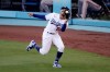Los Angeles Dodgers' Mookie Betts catches a fly ball hit by San Francisco Giants' Mike Yastrzemski during the first inning of a baseball game Sunday, July 26, 2020, in Los Angeles. (AP Photo/Jae C. Hong)