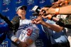 Los Angeles Dodgers' Joc Pederson is interviewed by reporters during Dodger Stadium FanFest Saturday, Jan. 25, 2020, in Los Angeles. (AP Photo/Mark J. Terrill)