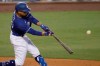 Los Angeles Dodgers' Mookie Betts flies out to center field during the fourth inning of an exhibition baseball game against the Arizona Diamondbacks Monday, July 20, 2020, in Los Angeles. (AP Photo/Marcio Jose Sanchez)