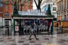 A person walks through Cardiff city centre, Sunday Dec. 20, 2020. In Wales, authorities said they decided to move up a lockdown planned for after Christmas and people must stay at home from 12:01 a.m. Sunday. The move will largely scrap Christmas gatherings in line with the rules for southern England. (Ben Birchall/PA via AP)