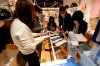 Lee Jin-man / The Associated Press
Employees of a department store prepare to sell face masks at a department store in Seoul, South Korea, Friday, Feb. 28, 2020. Countries take harsh containment steps as a new virus spreads. (AP Photo/Lee Jin-man)