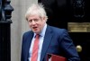 Britain's Prime Minister Boris Johnson leaves 10 Downing Street to attend the weekley session of Prime Ministers Questions in Parliament in London, Wednesday, Jan. 22, 2020. (AP Photo/Kirsty Wigglesworth)