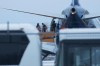 Passengers step off a plane carrying Canadians back from the Wuhan province in China, after it arrived at Canadian Forces Base Trenton in Trenton, Ont., on Tuesday, Feb. 11, 2020. THE CANADIAN PRESS/Lars Hagberg