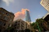 CP
A cloud from a massive explosion is seen in in Beirut, Lebanon, Tuesday, Aug. 4, 2020. Massive explosions rocked downtown Beirut on Tuesday, flattening much of the port, damaging buildings and blowing out windows and doors as a giant mushroom cloud rose above the capital. Witnesses saw many people injured by flying glass and debris. (AP Photo/Hassan Ammar)