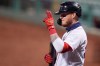 Boston Red Sox's Alex Verdugo salutes towards the Atlanta Braves dugout prior to his at-bat in the third inning of a baseball game Monday, Aug. 31, 2020, in Boston. (AP Photo/Charles Krupa)
