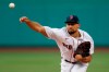 Boston Red Sox's Nathan Eovaldi pitches during the first inning of an opening day baseball game against the Baltimore Orioles, Friday, July 24, 2020, in Boston. (AP Photo/Michael Dwyer)