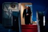 President Donald Trump and first lady Melania Trump exit Air Force One, Sunday, Jan. 5, 2020, at Andrews Air Force Base, Md., following a trip to his Mar-a-Lago estate. (AP Photo/Kevin Wolf)