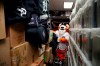 Paws, the Detroit Tigers mascot, helps load equipment at Comerica Park in Detroit, Monday, Feb. 3, 2020 in preparation for the move to Lakeland, Fla., for the opening of spring training. (AP Photo/Carlos Osorio)