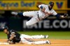 FILE - Detroit Tigers second baseman Josh Harrison (1) falls after throwing to first base while Chicago White Sox's Tim Anderson, bottom, is out on a fielder's choice during a baseball game in a Friday, April 26, 2019 file photo, in Chicago. Utility player Josh Harrison has signed a one-year contract with the Washington Nationals. The Nationals added the 33-year-old Harrison to their 30-man active roster Monday, July 27, 2020. (AP Photo/Nuccio DiNuzzo, File)