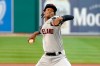 Cleveland Indians starting pitcher Triston McKenzie throws against the Detroit Tigers in the first inning of a baseball game Saturday, Sept. 19, 2020, in Detroit. (AP Photo/Jose Juarez)