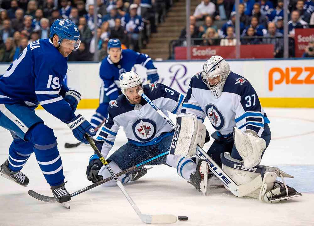THE CANADIAN PRESS/Frank Gunn
Goaltender Connor Hellebuyck has had to shoulder much of the load for the low-scoring Jets.