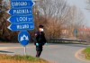 A Carabinieri (Italian paramilitary police) officer checks transit to or from the cordoned area in Codogno, some 50 kilometers South-East of Milan, Italy, Monday, Feb. 24, 2020. Police manned checkpoints around quarantined towns in Italy's north on Monday and residents stocked up on food as the country became the focal point of the outbreak in Europe and fears of its cross-border spread. (AP Photo/Antonio Calanni)