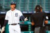 Detroit Tigers' Miguel Cabrera talks with home plate umpire David Rackley after striking out against the Cincinnati Reds in the fourth inning of a baseball game in Detroit, Friday, July 31, 2020. (AP Photo/Paul Sancya)
