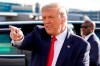 President Donald Trump gestures to supporters as he arrives at Minneapolis Saint Paul International Airport, Wednesday, Sept. 30, 2020, in Minneapolis. (AP Photo/Alex Brandon)