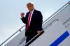 President Donald Trump gestures as he steps off Air Force One upon arrival at Minneapolis Saint Paul International Airport, Wednesday, Sept. 30, 2020, in Minneapolis. (AP Photo/Alex Brandon)