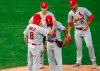 St. Louis Cardinals manager Mike Shildt (8) consoles pitcher Carlos Martinez on the cap as he pulls him following a solo home run by Minnesota Twins' Josh Donaldson in the fourth inning of a baseball game Tuesday, July 28, 2020, in Minneapolis. (AP Photo/Jim Mone)